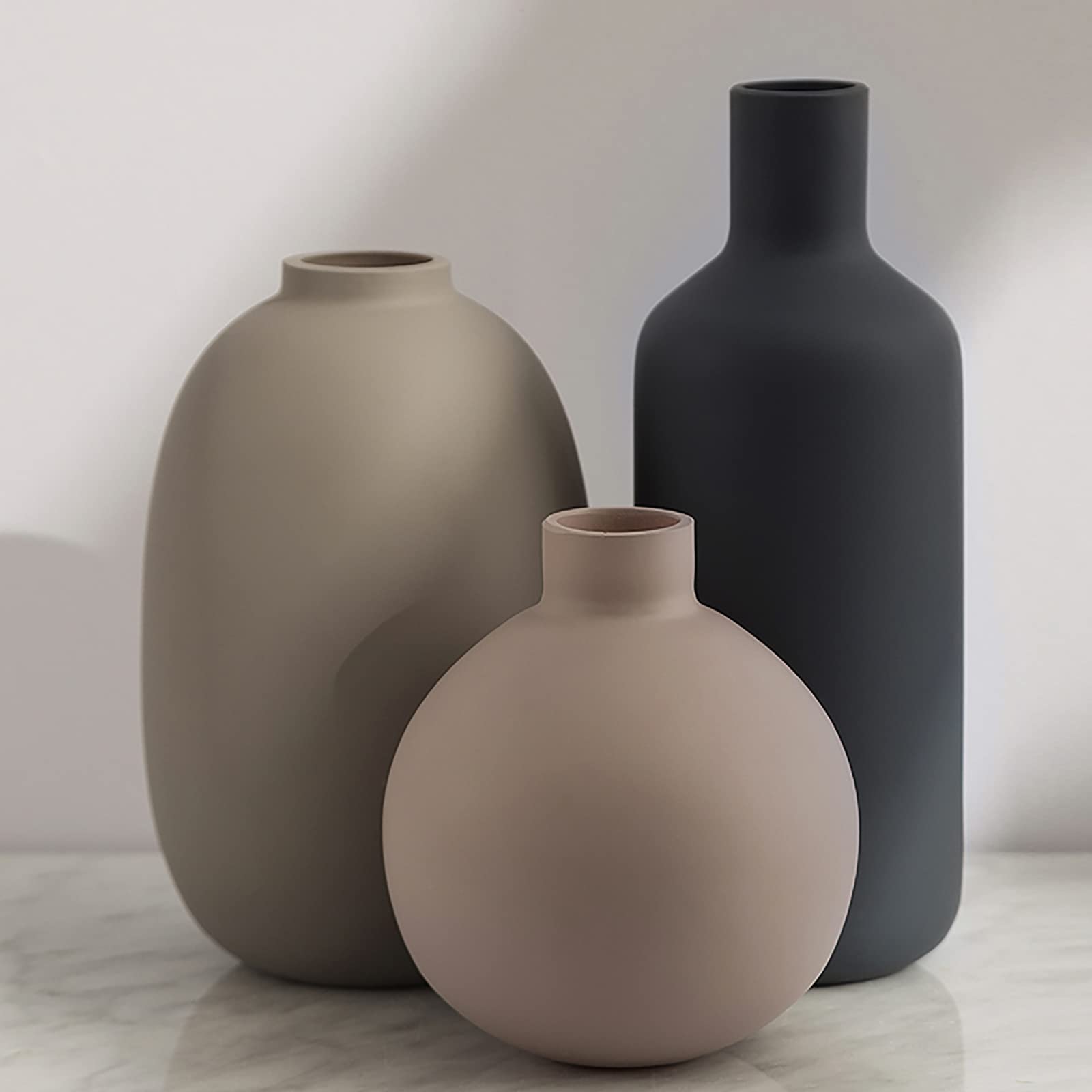Smiletag vase set of 3 in neutral tones elevates a table centerpiece