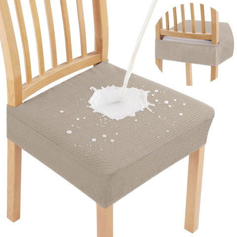 Smiry taupe four-pack dining chair slipcovers protecting seats during meals