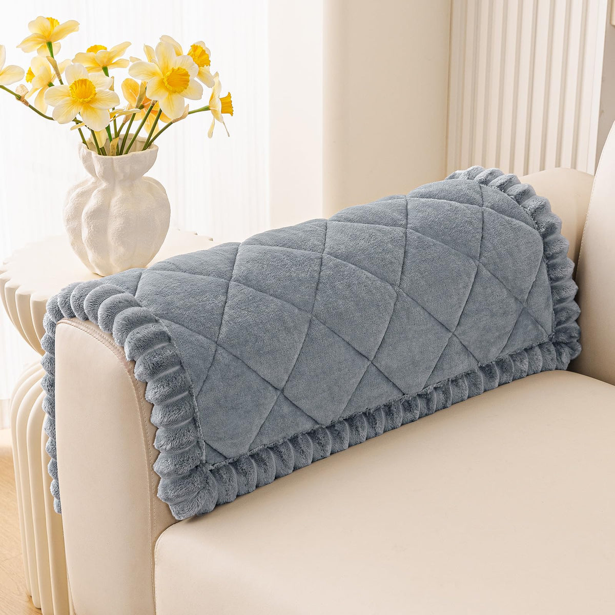 Smiry fuzzy couch cover with non-slip backing protects your sofa from scratches.