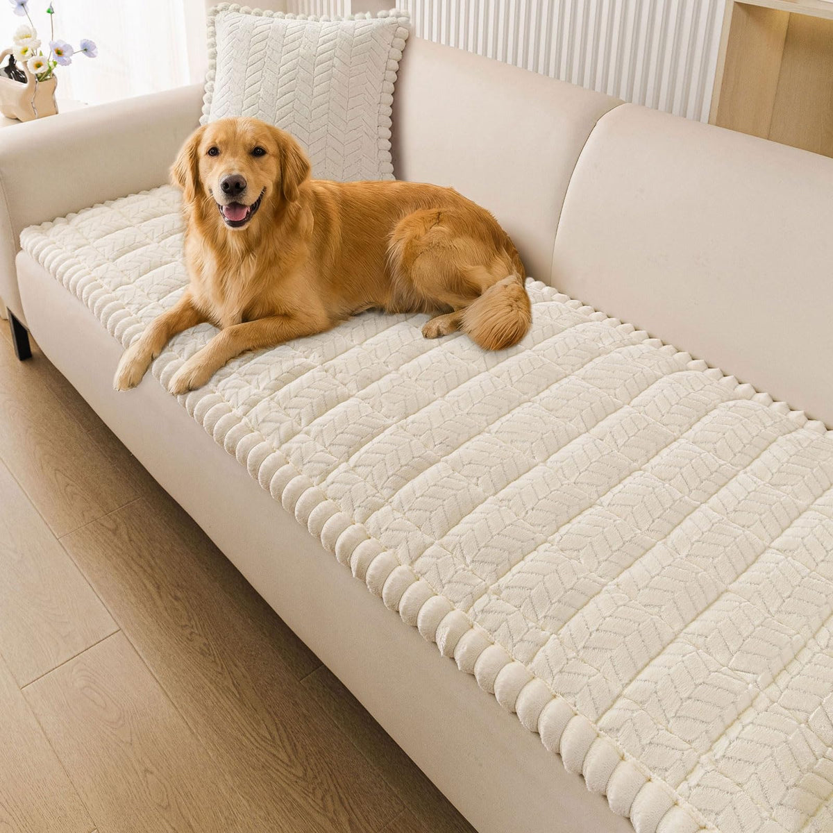 Smiry non-slip couch cover protects a beige sofa from paw marks
