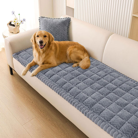 Smiry non-slip dog couch cover on a grey sofa protects upholstery from fur and spills.