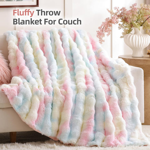 Smoofy 60-by-80-inch blanket on bed offers full-room warmth.