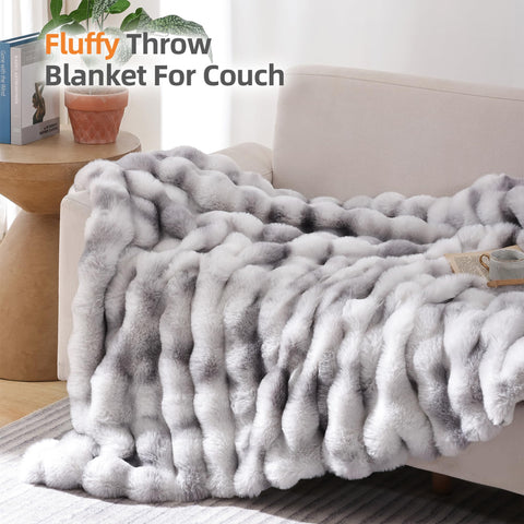 Smoofy faux fur blanket close-up showcases cloud-like softness for lounging.