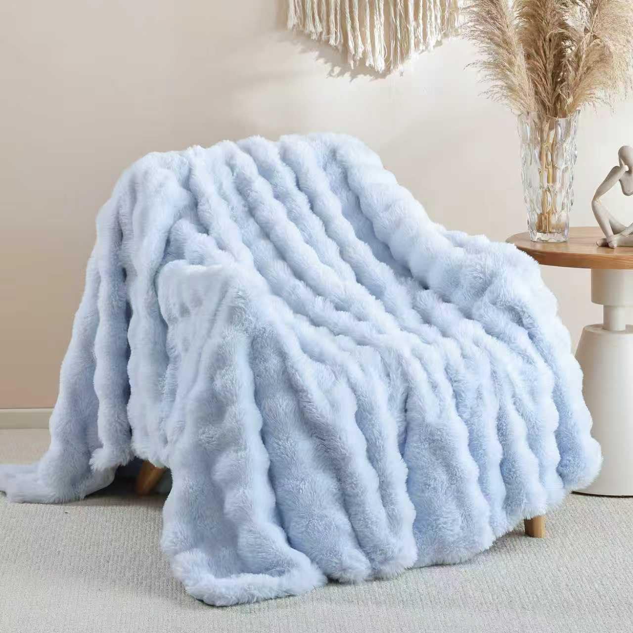Smoofy faux fur throw blanket in light blue adds cozy couch warmth