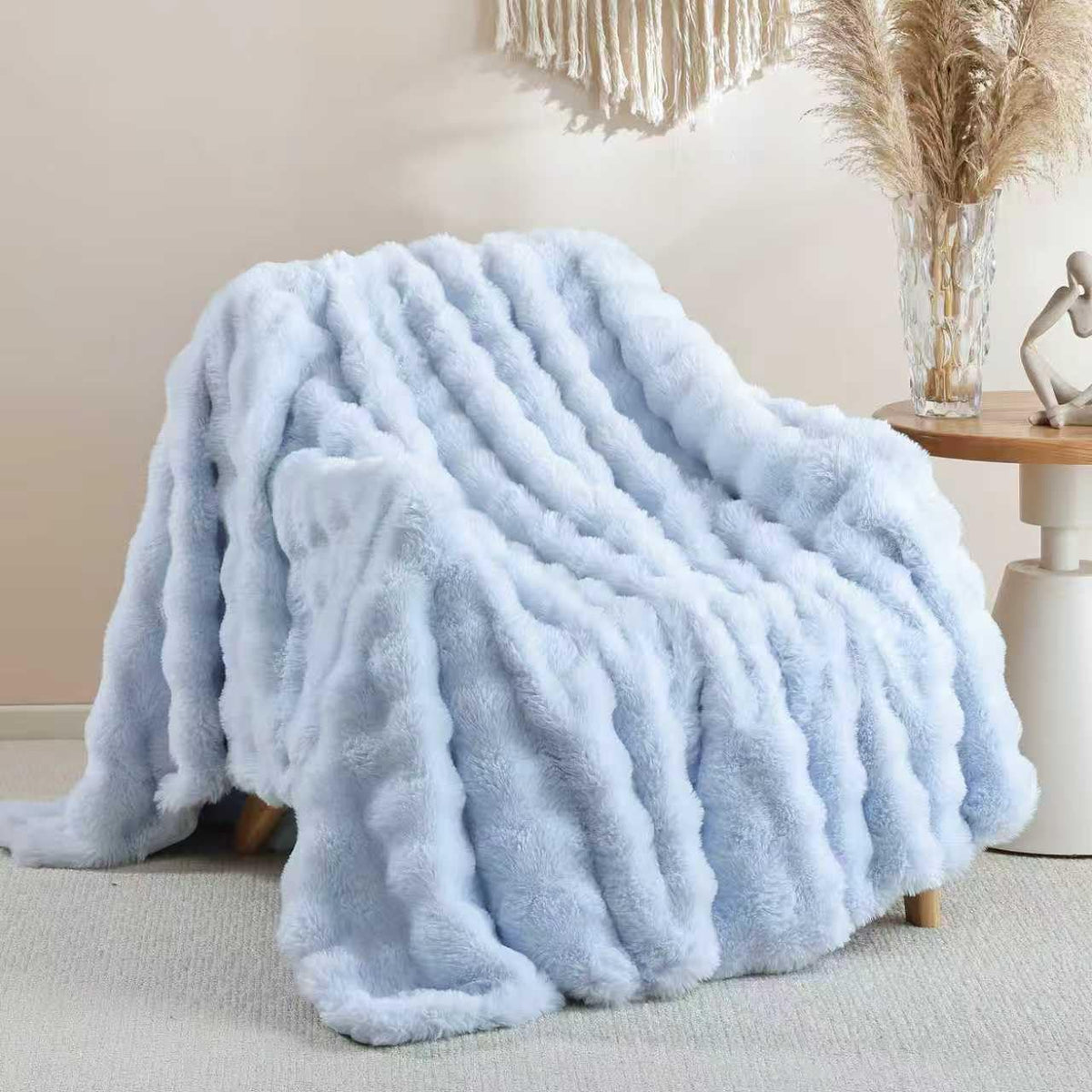 Smoofy faux fur throw blanket in light blue adds cozy couch warmth