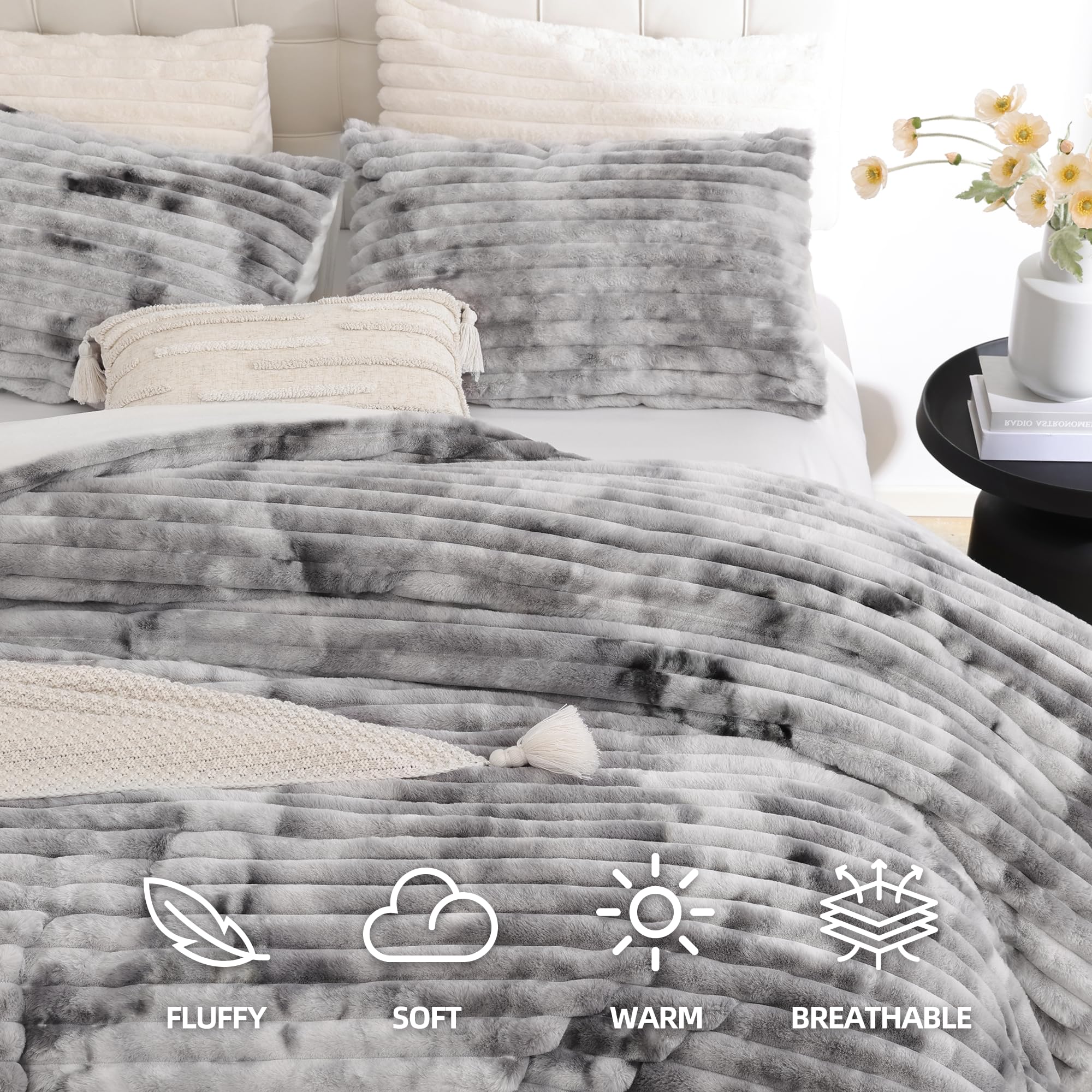 Smoofy tie-dye grey fleece texture highlighting plush warmth.