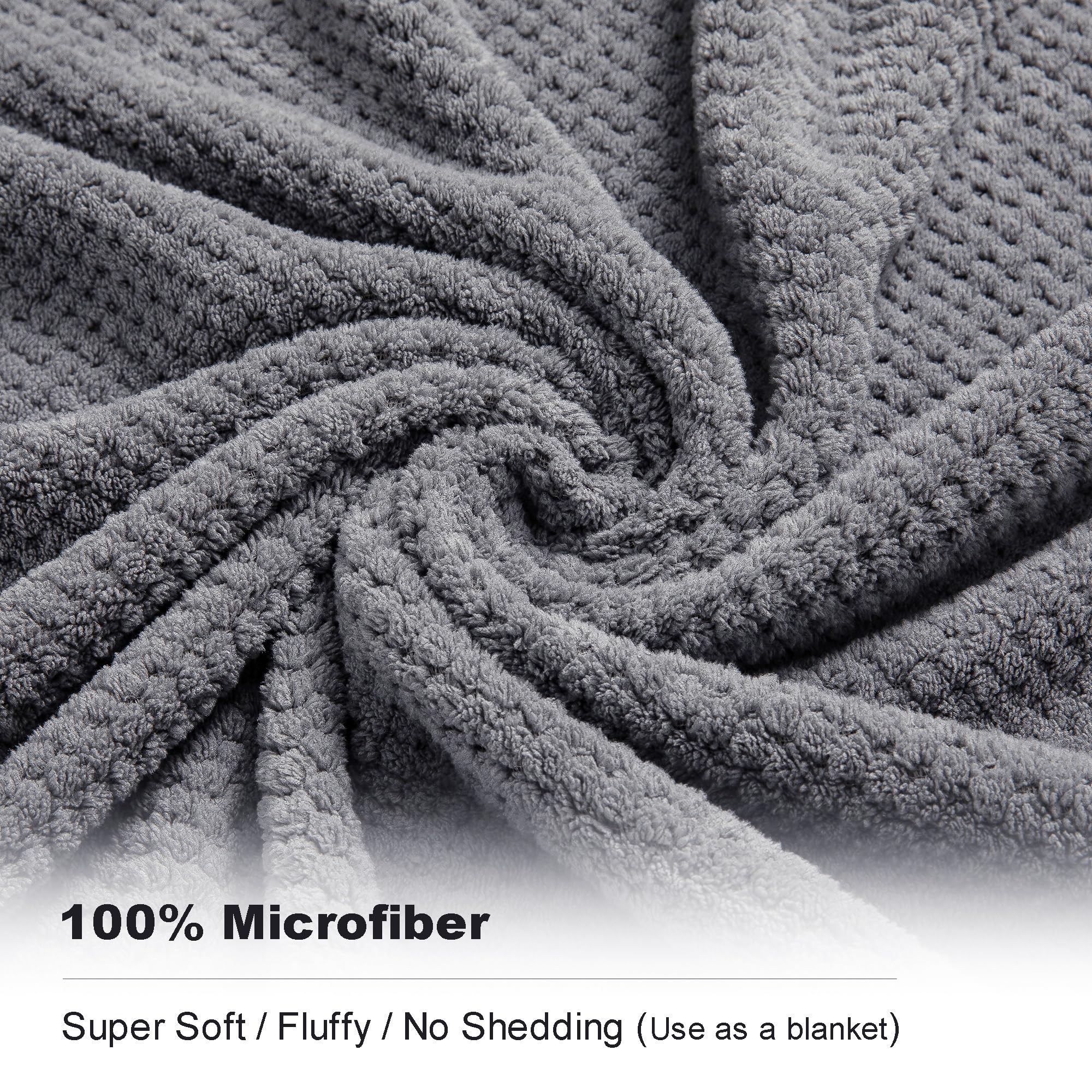 Smuge spa-ready towel on rack in gray for lounging after showers