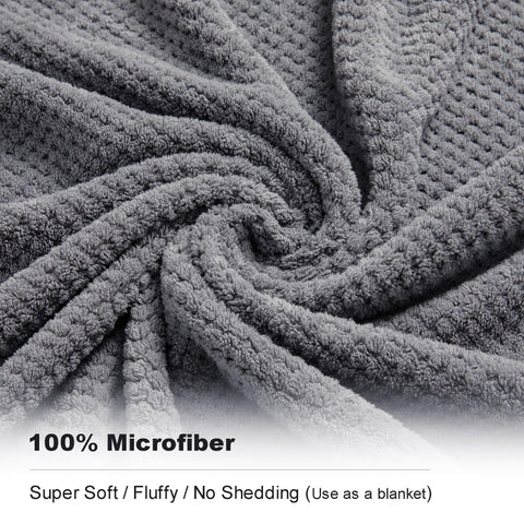 Smuge spa-ready towel on rack in gray for lounging after showers