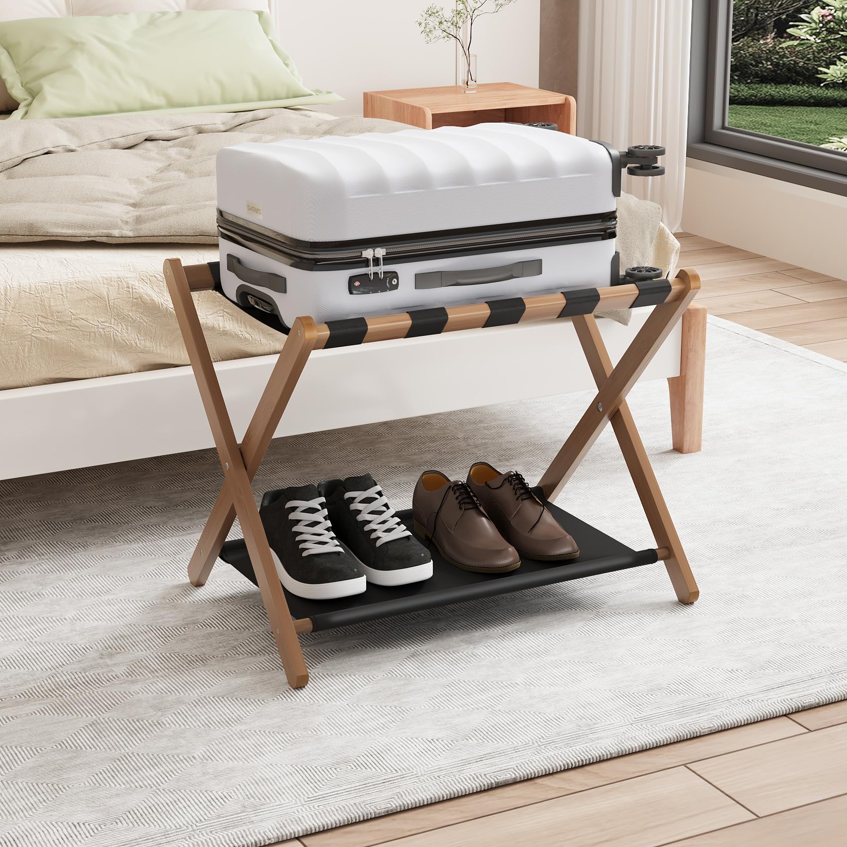 Smuxee luggage rack in hotel room setup for guest convenience.