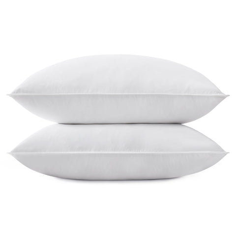 SNUG&COZY two-pack goose pillows on bed offering balanced support.