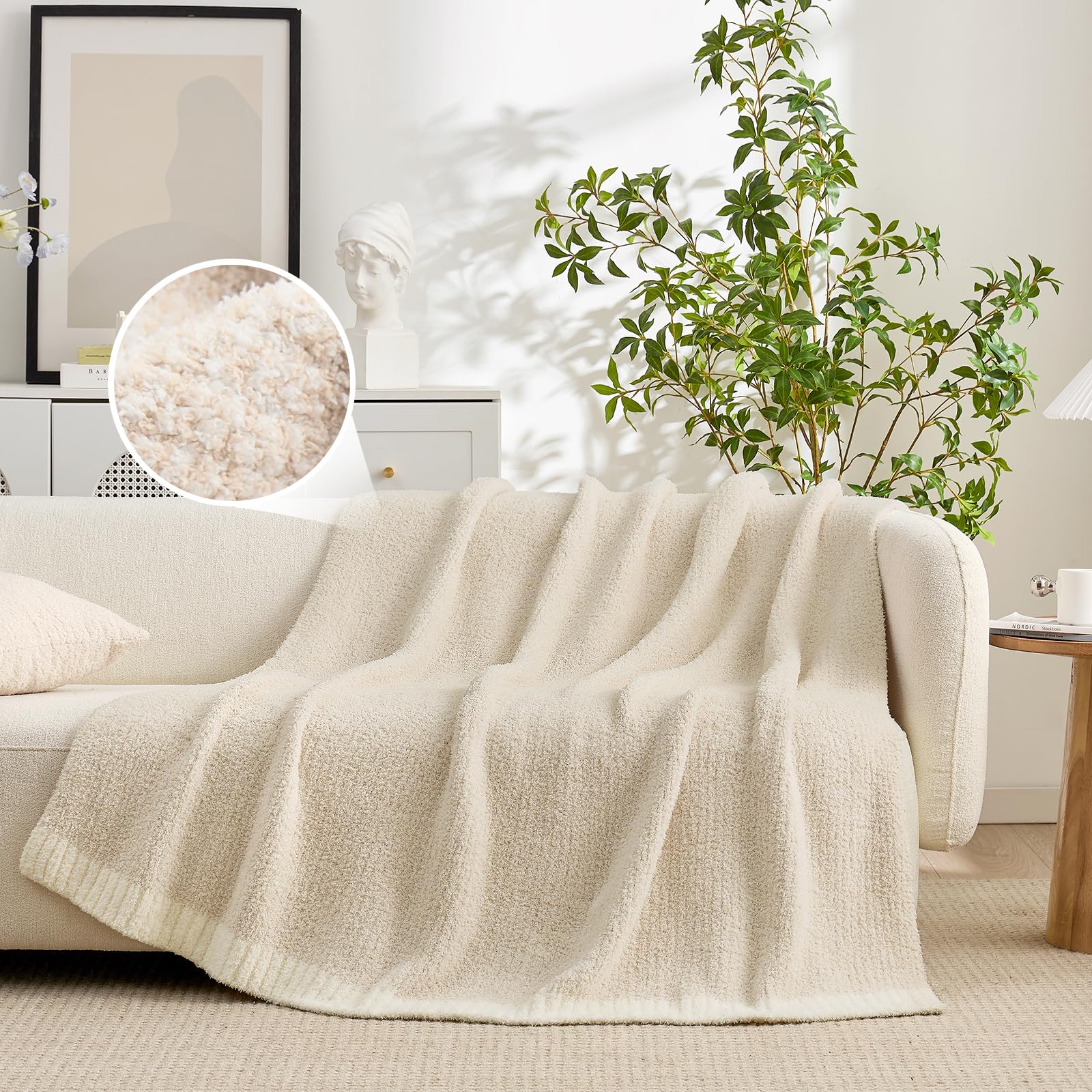 Snuggle Sac blanket draped over sofa creates inviting living room vignette