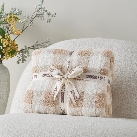 Snuggle Sac beige plaid blanket adds timeless style to any room