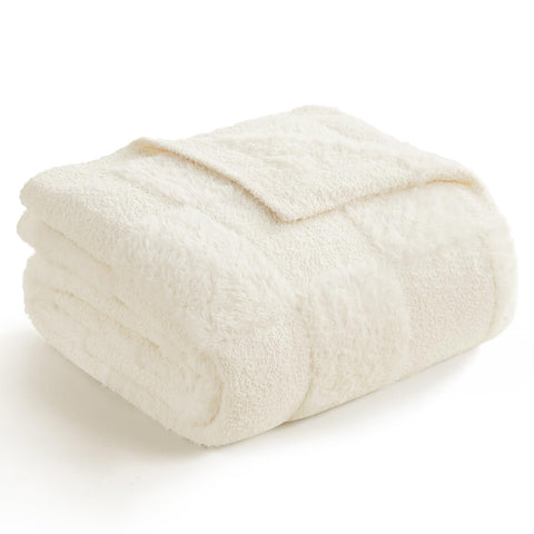 Snuggle Sac checkered throw with faux fur texture elevating cozy living room decor.