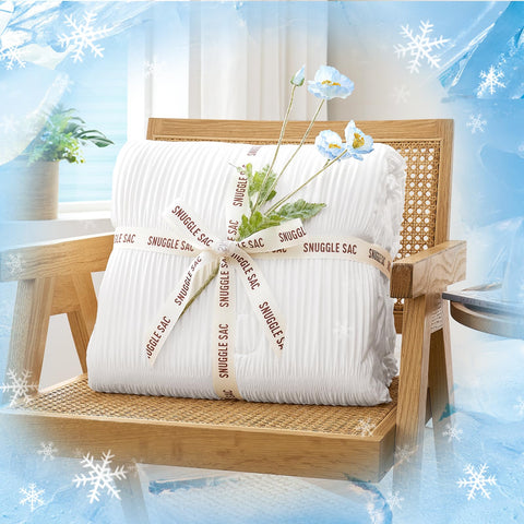 Snuggle Sac cooling comforter queen in-bed scene demonstrates all-season versatility for hot sleepers.