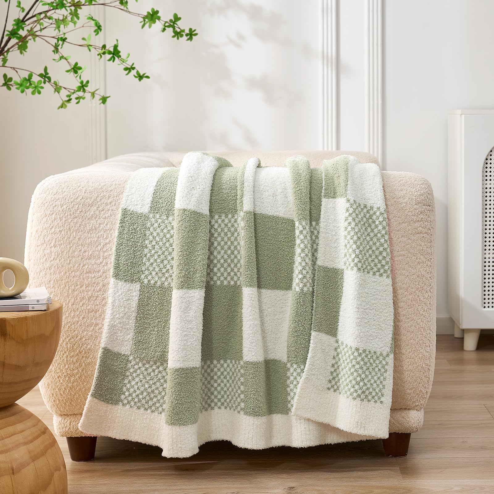 Snuggle Sac cozy throw on a couch adds inviting warmth for movie nights.