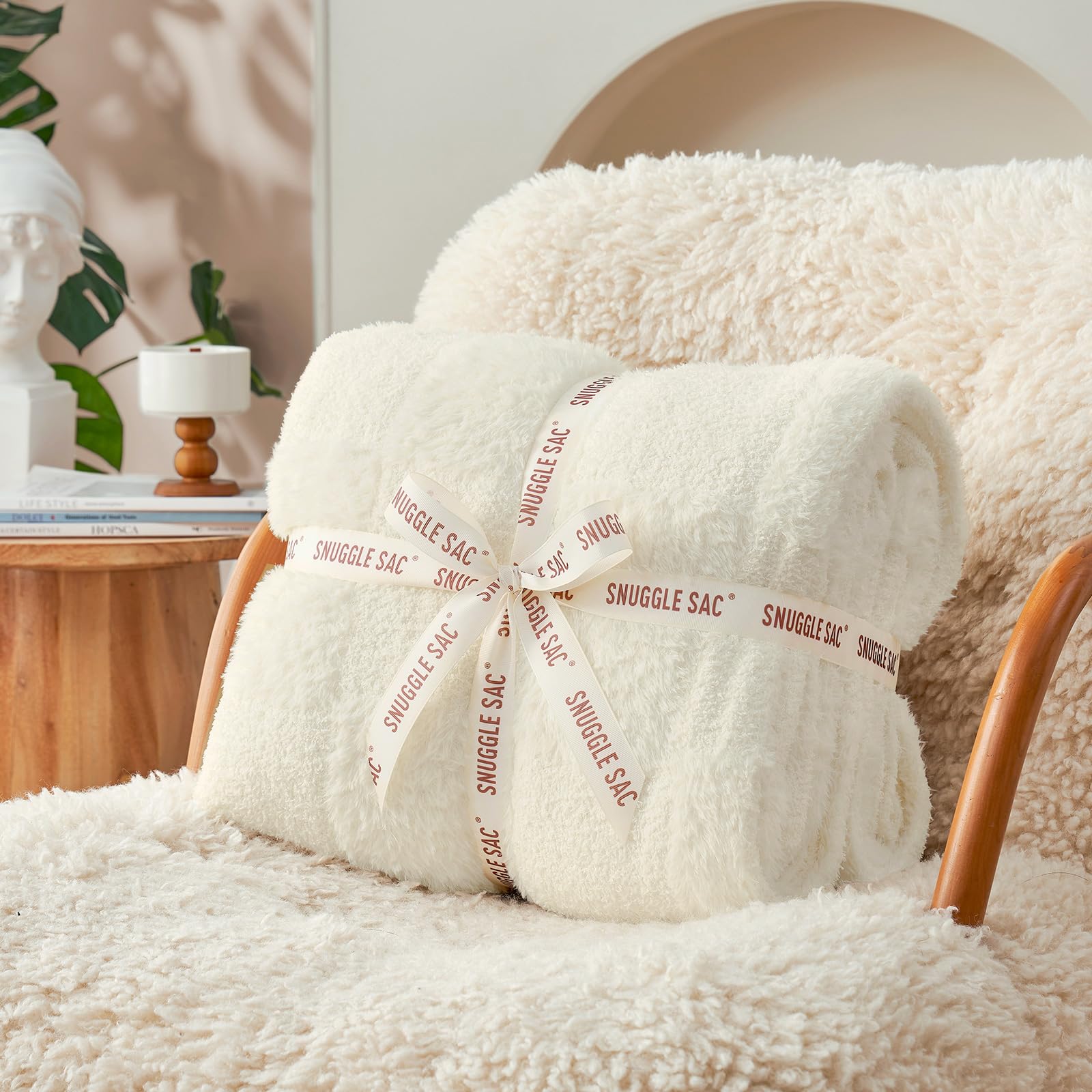 Snuggle Sac gift-ready blanket with silk ribbon packaging for thoughtful gifting.