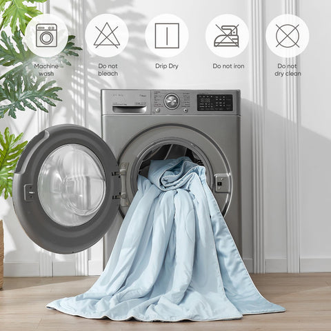 Blue-toned bedding setup with breathable viscose cooling comforter for refreshed nights