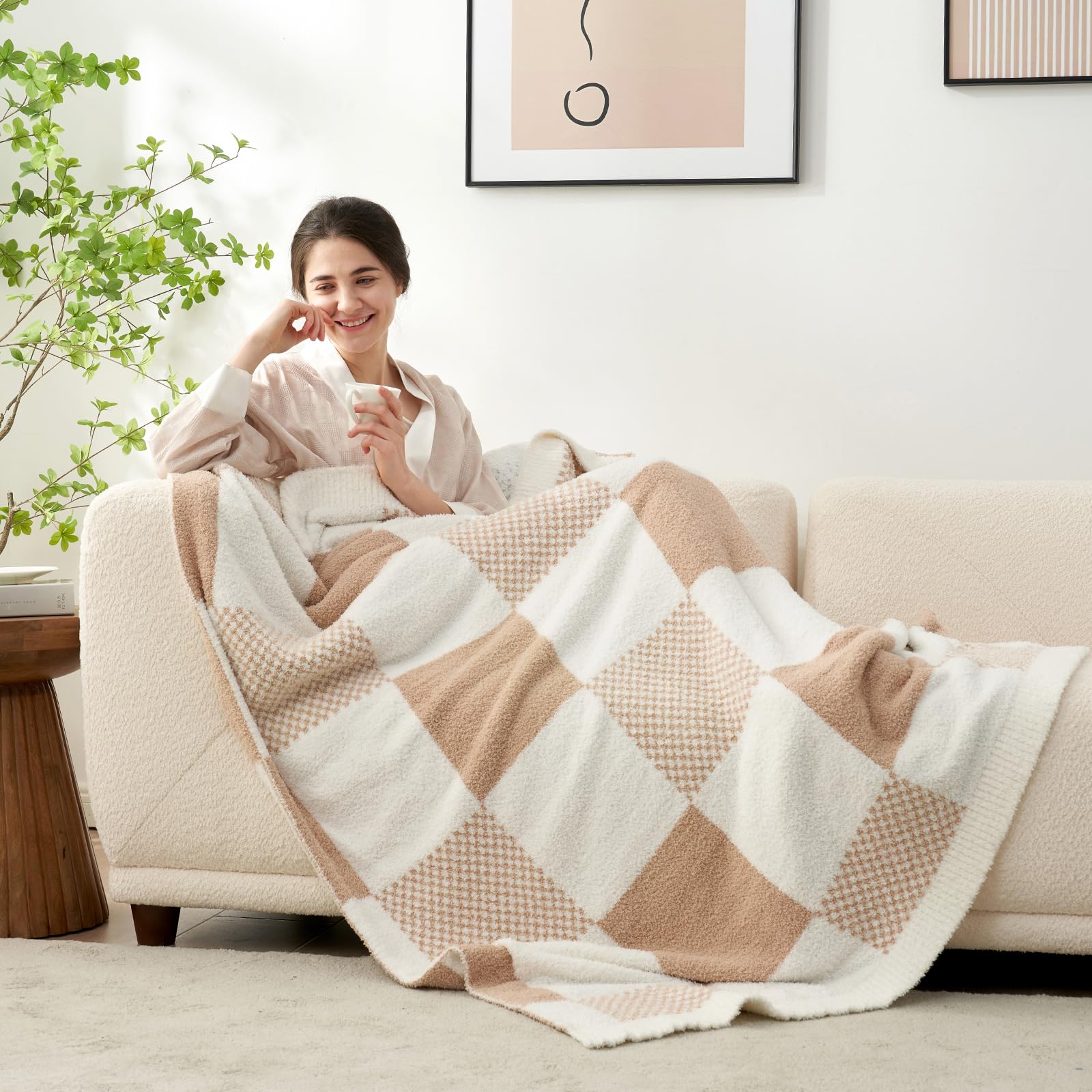 Snuggle Sac giftable checkered throw, elegantly wrapped with a bow.