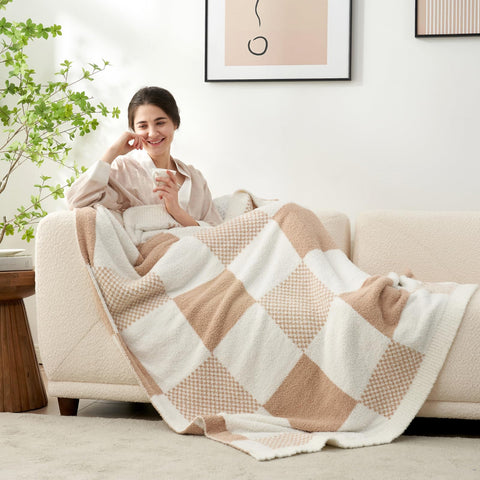 Snuggle Sac giftable checkered throw, elegantly wrapped with a bow.