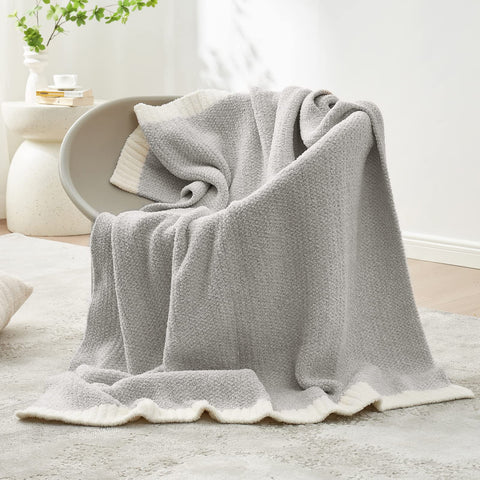 Snuggle Sac heather grey throw on sofa adding decorative warmth