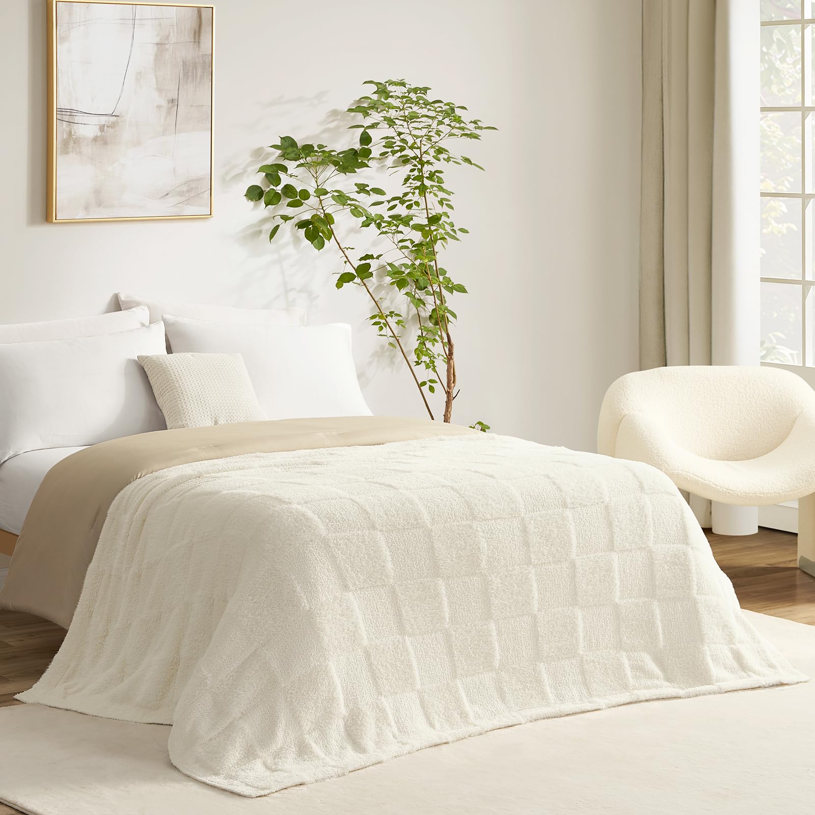 Snuggle Sac ivory throw draped on sofa shows soft, lightweight warmth.