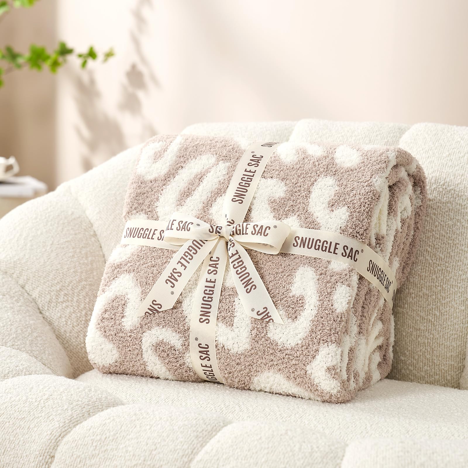 Snuggle Sac ribbon-packaged gift-ready presentation highlights gifting option.