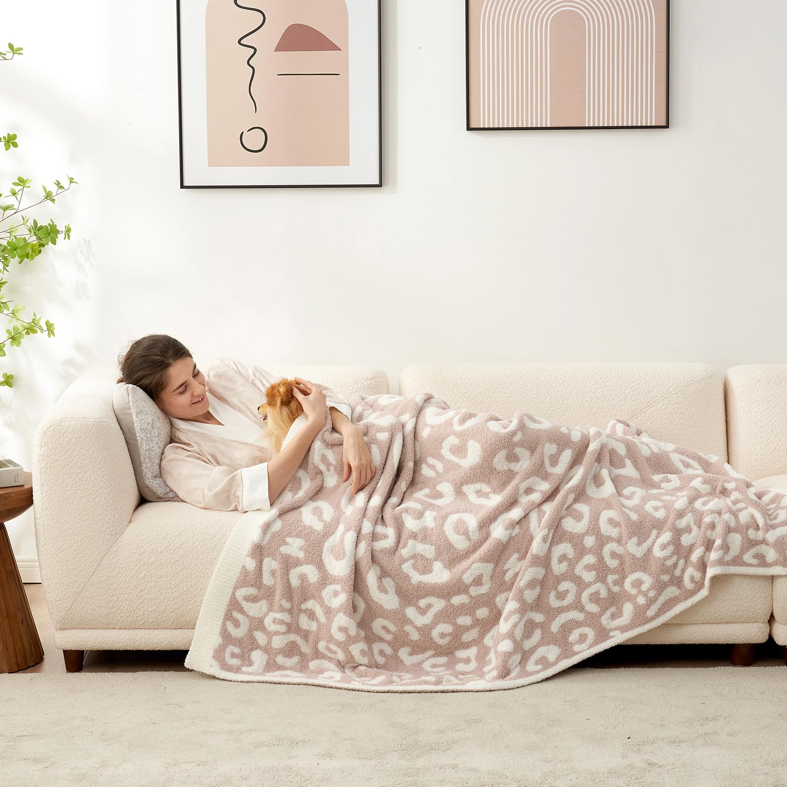Snuggle Sac leopard blanket on bed adds luxurious softness for evenings.