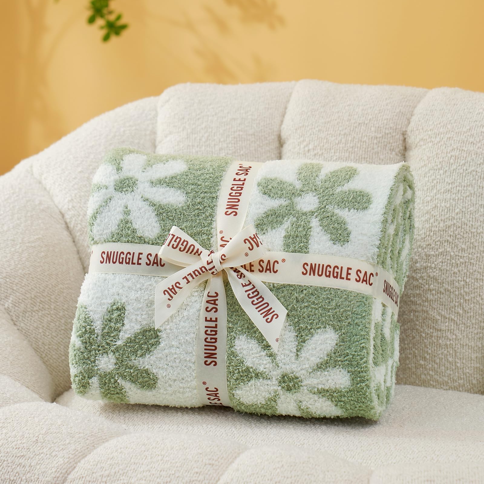 Snuggle Sac plaid blanket adds color and style to any living room.