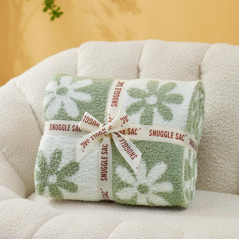 Snuggle Sac plaid blanket adds color and style to any living room.
