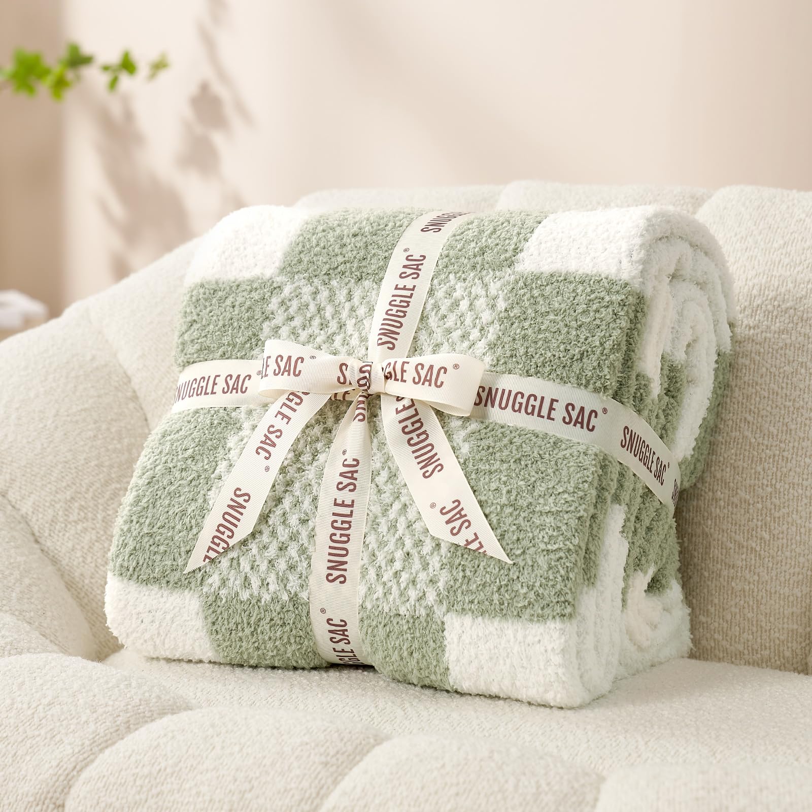 Snuggle Sac plaid design close-up highlights classic two-tone stitching.