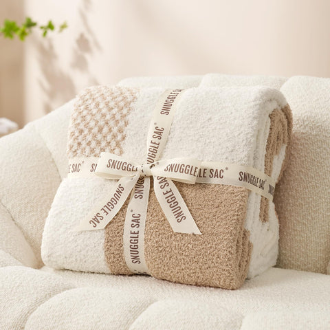 Snuggle Sac plaid design soft blanket complements living room decor.