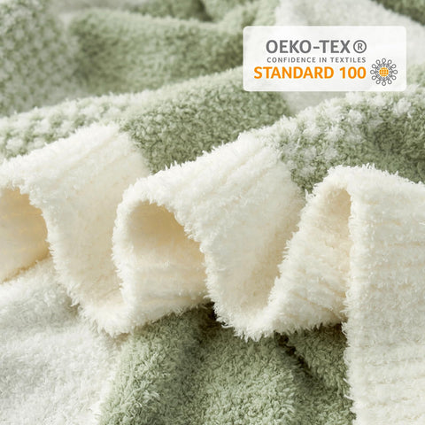 Snuggle Sac reversible blanket demonstrates versatile plaid and solid sides.