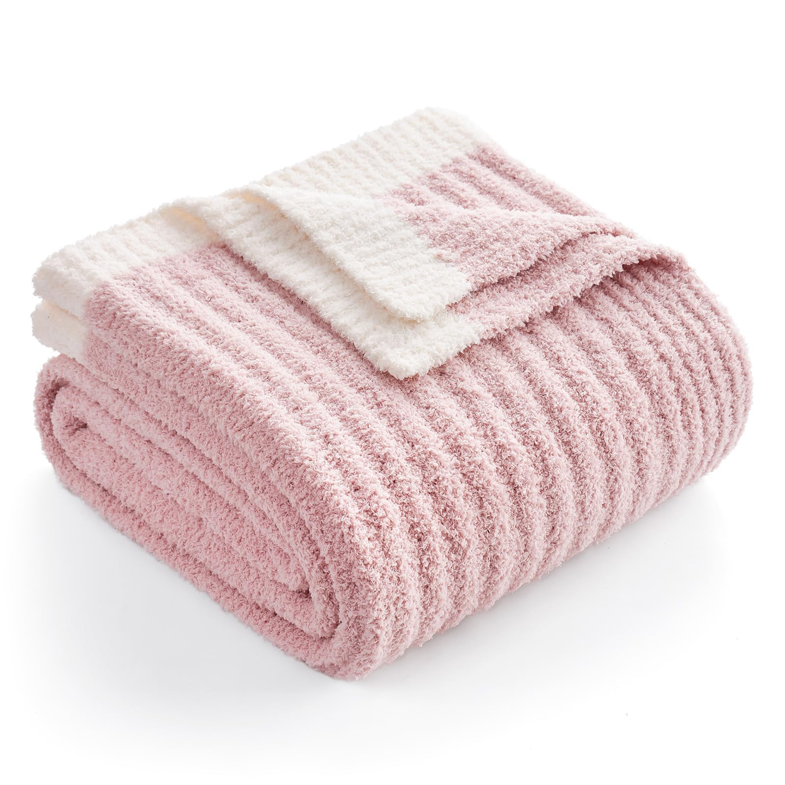Snuggle Sac Spring Pink Throw on sofa for a cozy evening