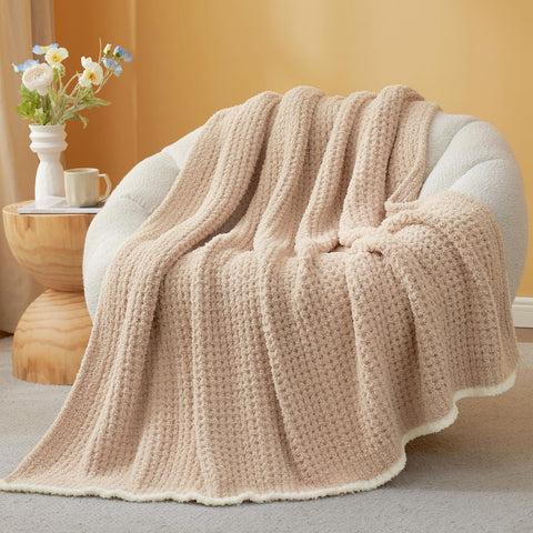 Snuggle Sac waffle throw shown on a sofa for cozy lounging