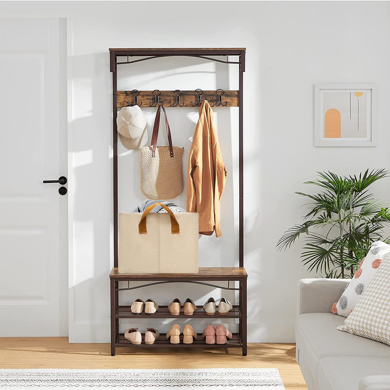 SNWDN beige bin used for baby clothes on nursery shelf