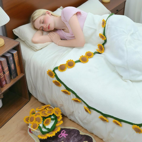 SoffMoiis crochet sunflower bouquet blanket 40 inch on sofa highlighting softness