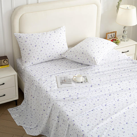 Softan pillowcases complete the purple-themed bed set.