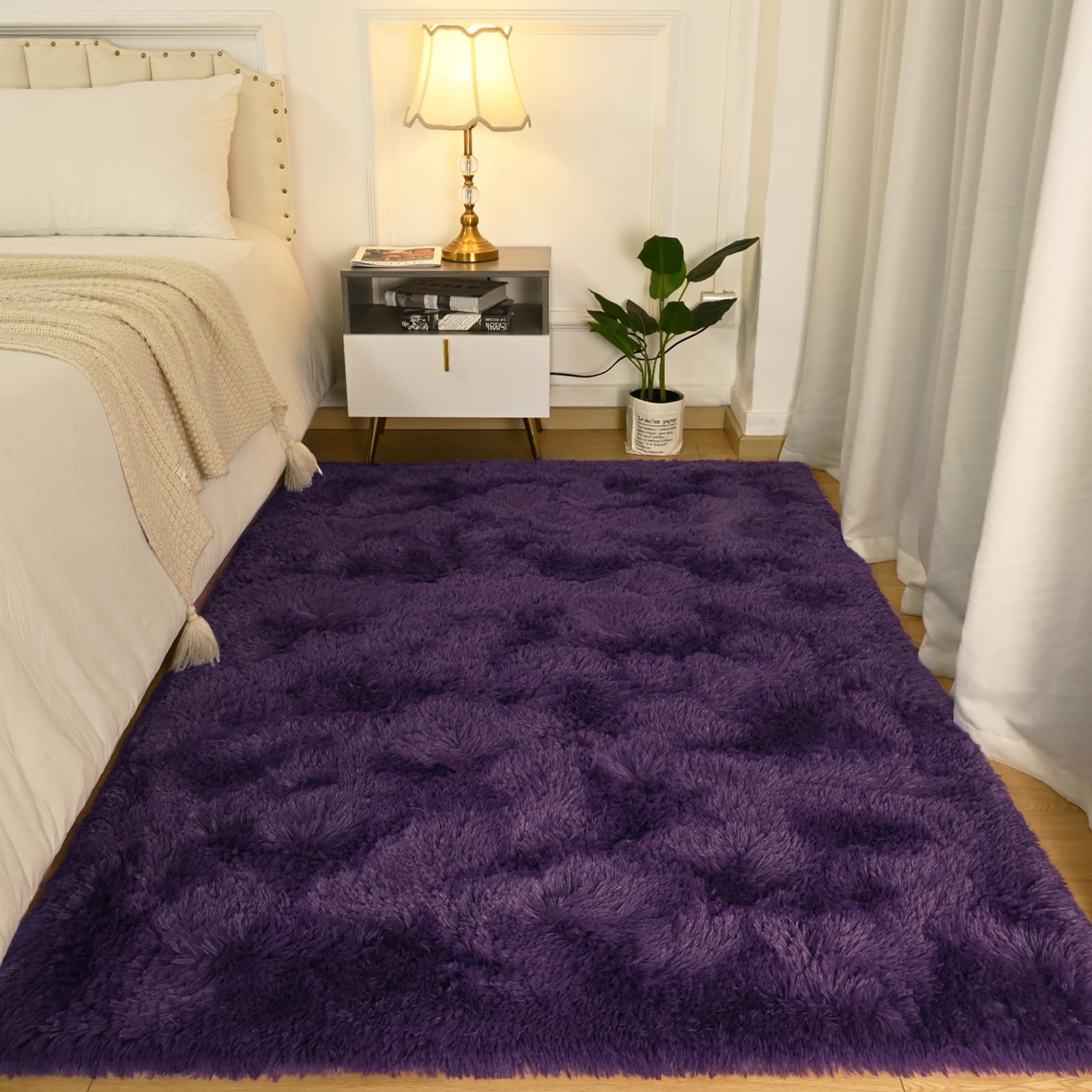 Softlife purple shag rug bedside setup offers cozy warmth and plush underfoot.