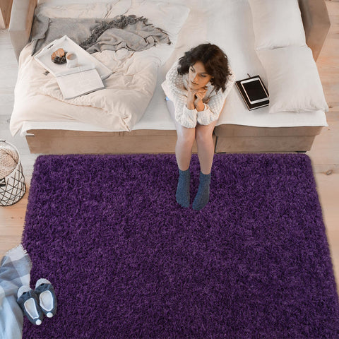 Softlife purple shag rug dorm room delivers comfort underfoot during study and rest.