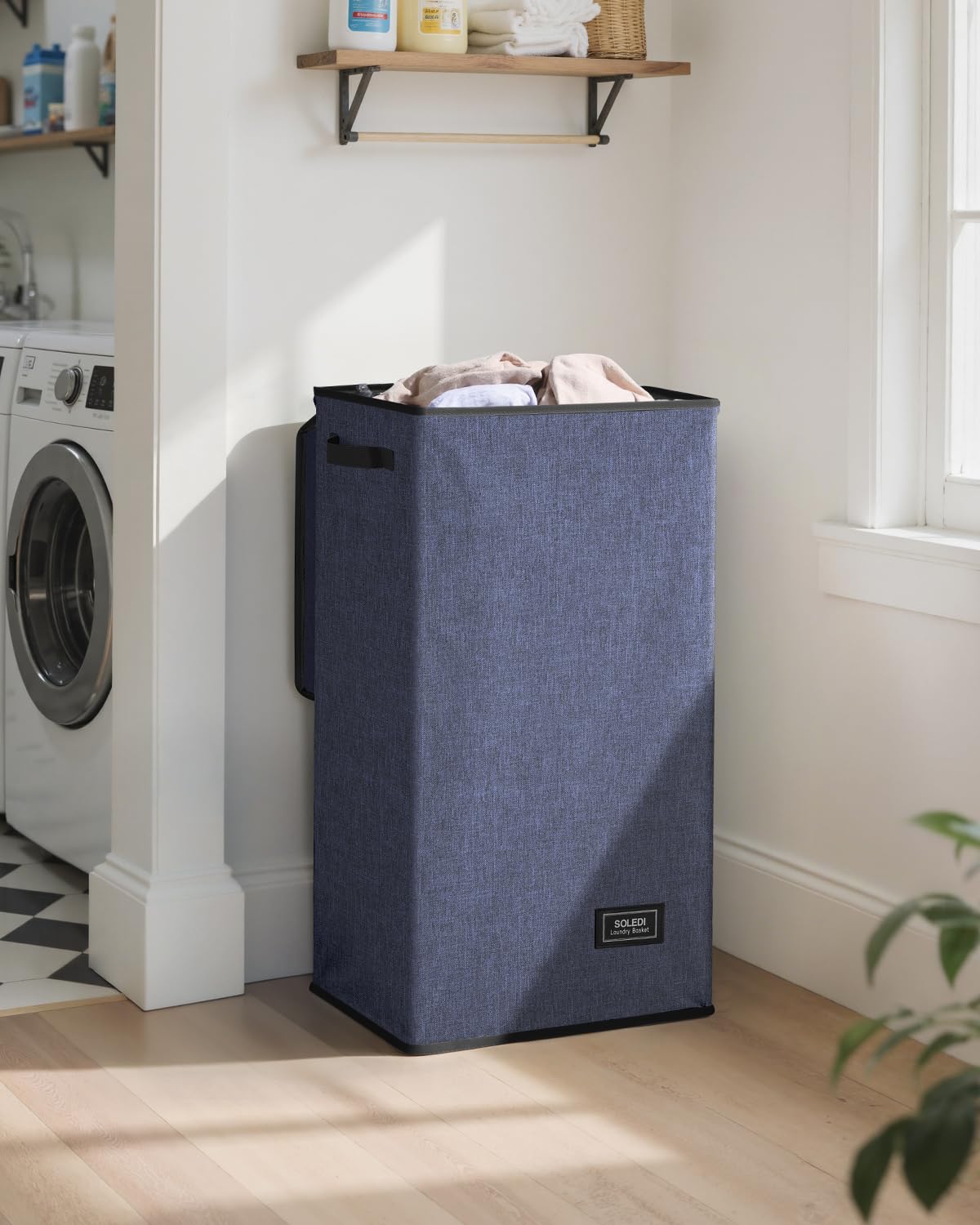 SOLEDI 100L capacity hamper full of clothes for a week's laundry needs