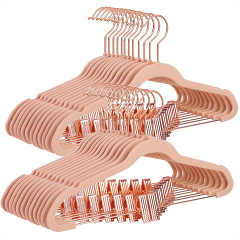 SONGMICS 24-pack pants hangers with rose gold clips for organized, sparkly storage.