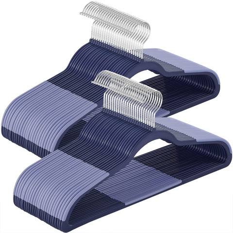 Songmics 50-pack plastic coat hangers showing space-saving design for compact closets.