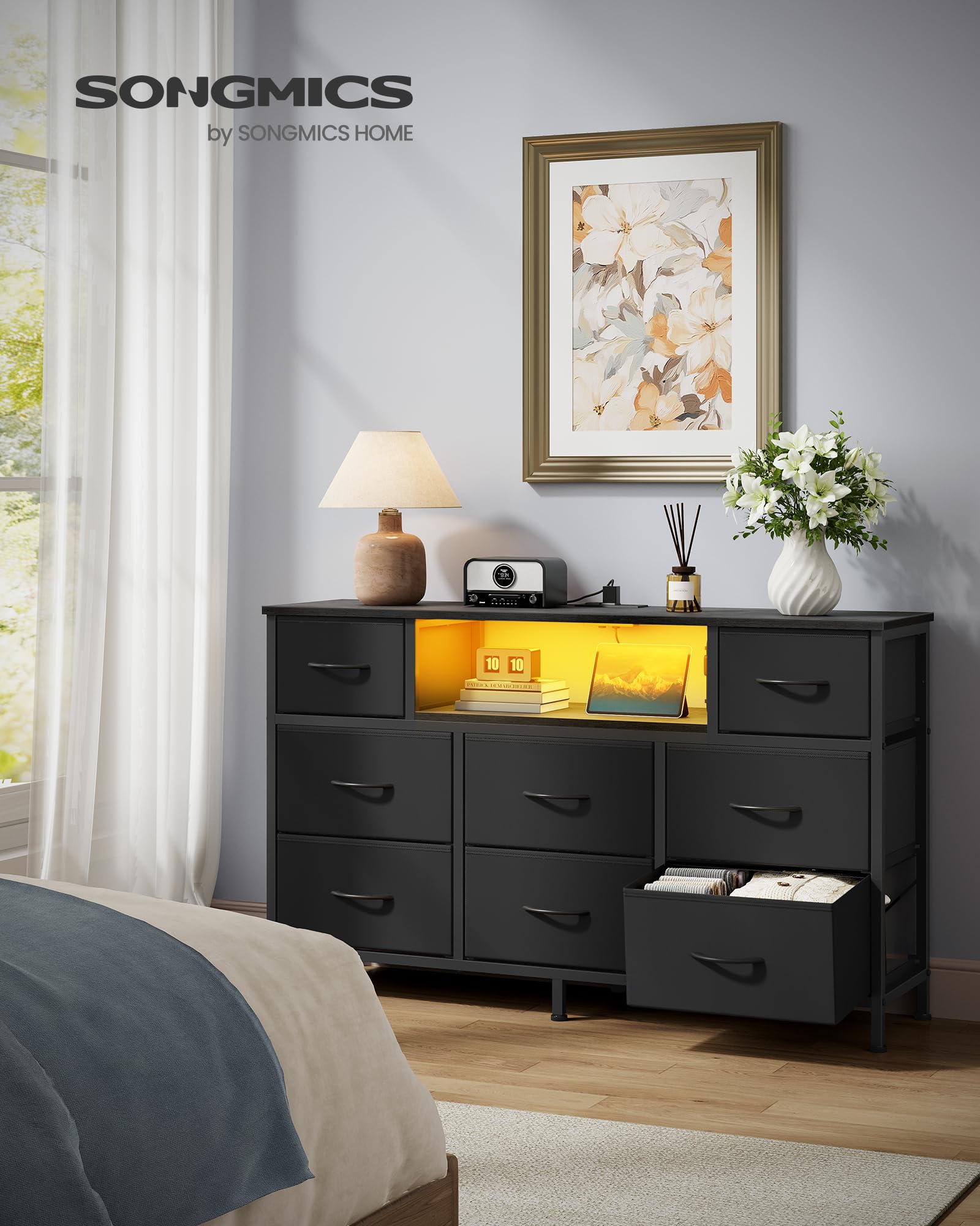 SONGMICS BELLAH dresser showing built-in outlets for device charging