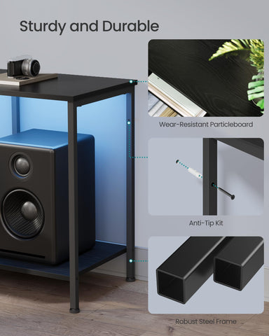 Songmics Bellah open shelves and drawer for versatile media storage.