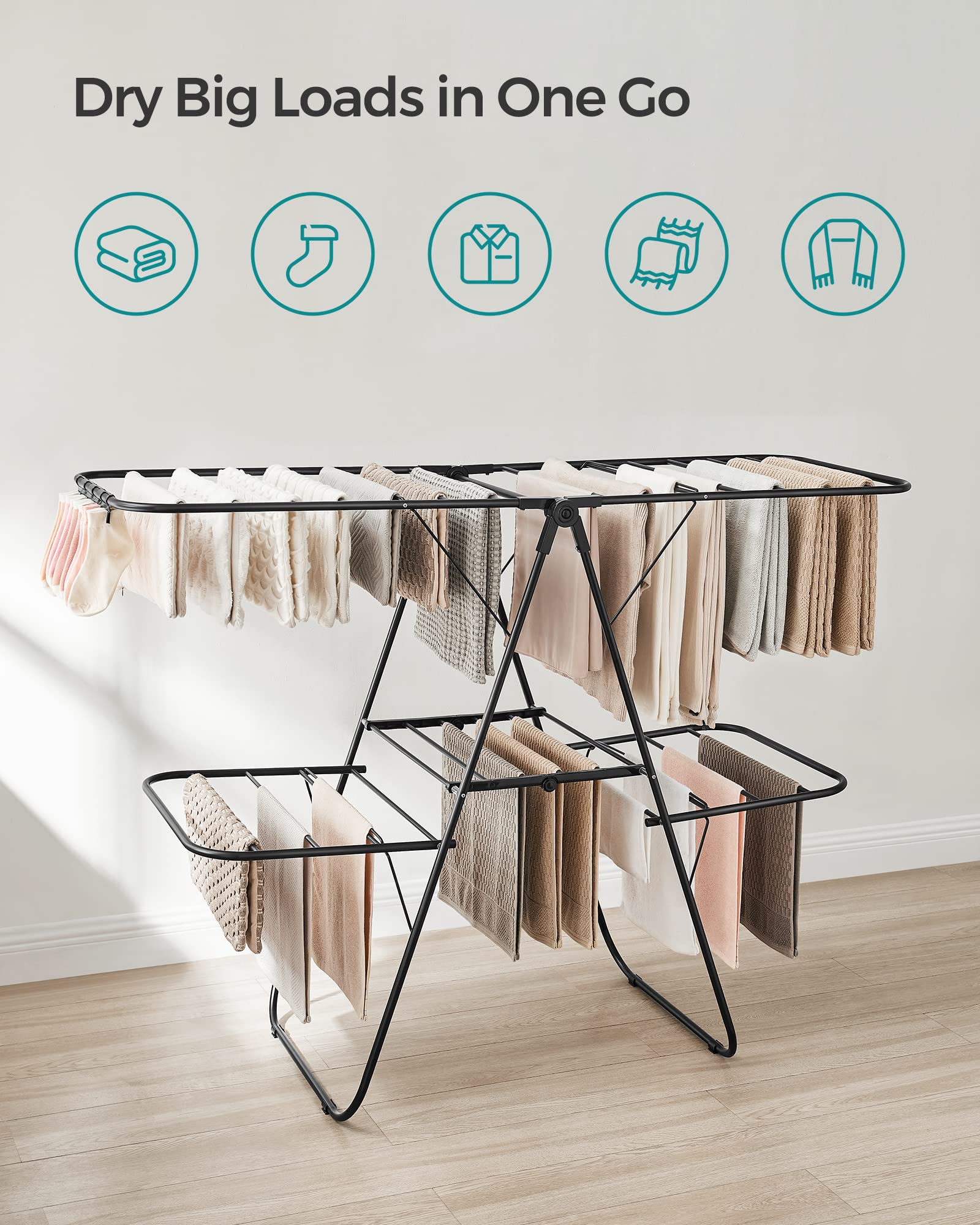 Height adjustable wings on Songmics rack for different garment lengths.