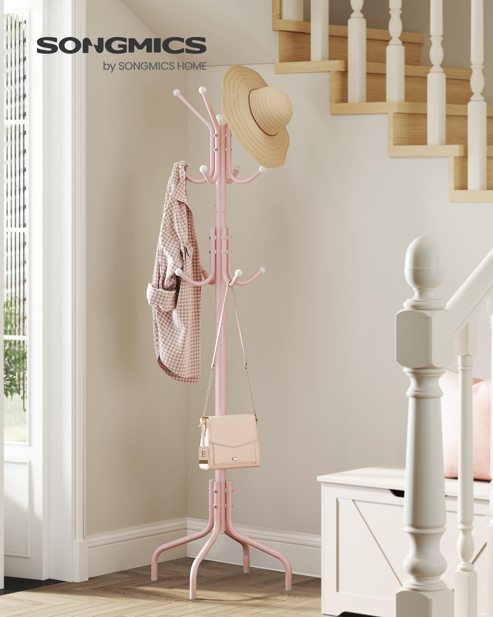 SONGMICS jelly pink coat rack base with four legs for balanced stability.