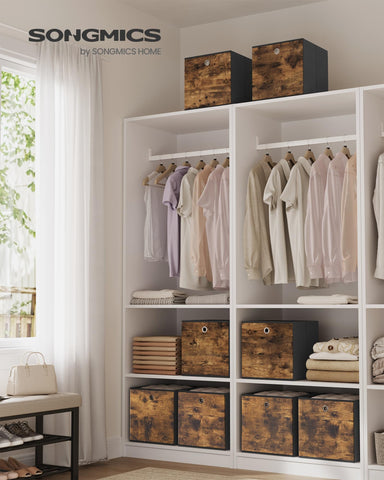 Songmics cube storage box with grommet handle, easy to pull from a shelf.