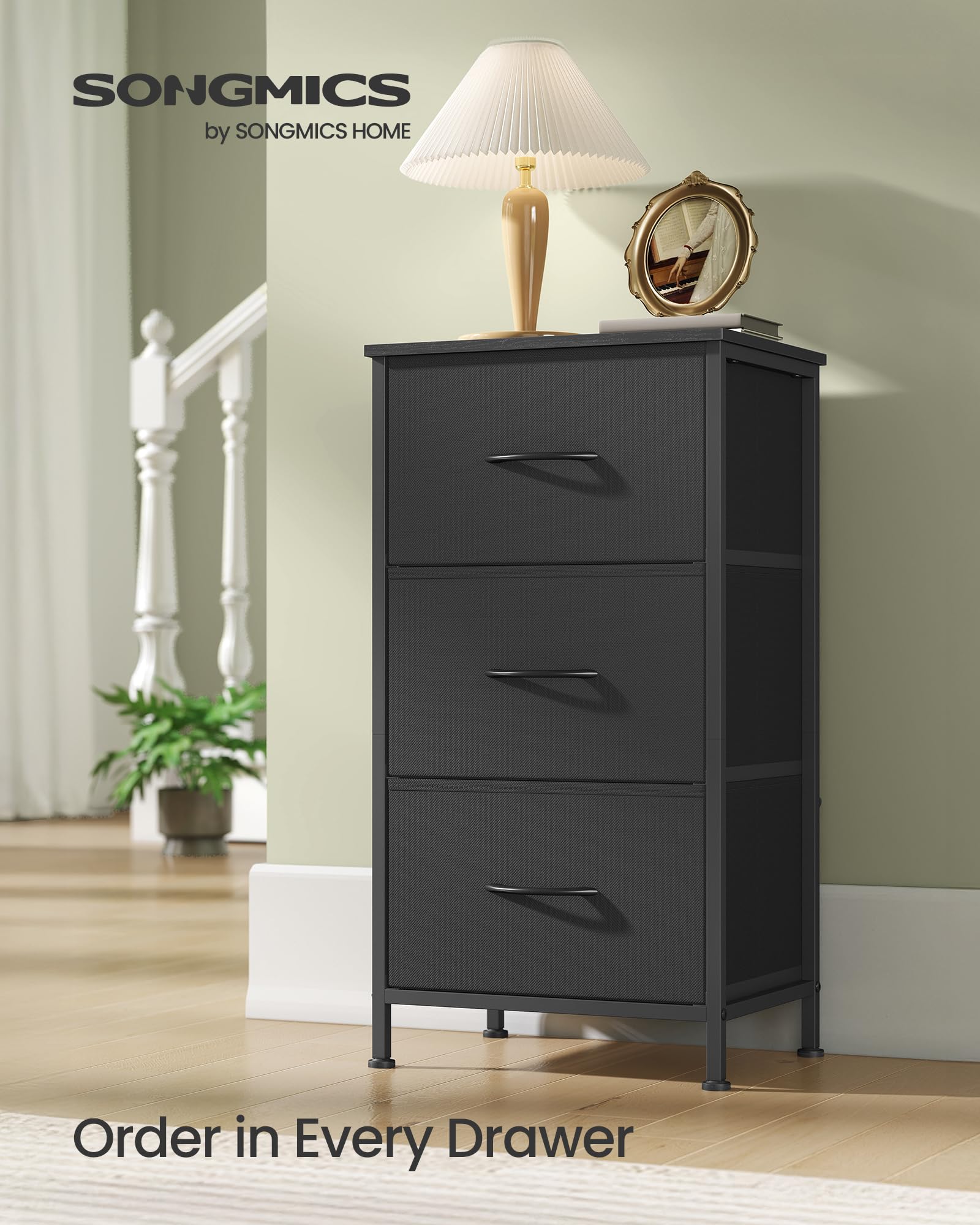SONGMICS dresser ink-black drawer open shows fabric drawers for tidy storage
