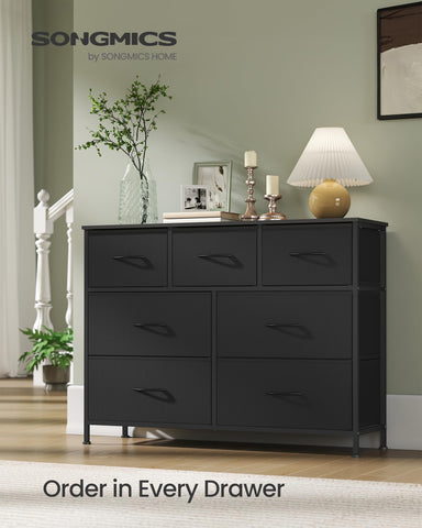 SONGMICS dresser with MDF top provides a stable surface for decor.