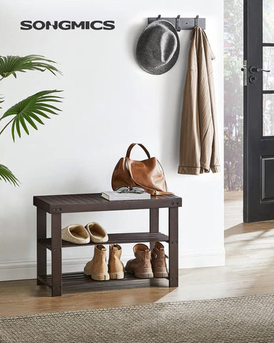 Songmics entryway bench in natural bamboo finish provides durable seating.